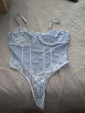 Baby blue thong bodysuit Wuth Light Blue Lace Detail with all sheer material.